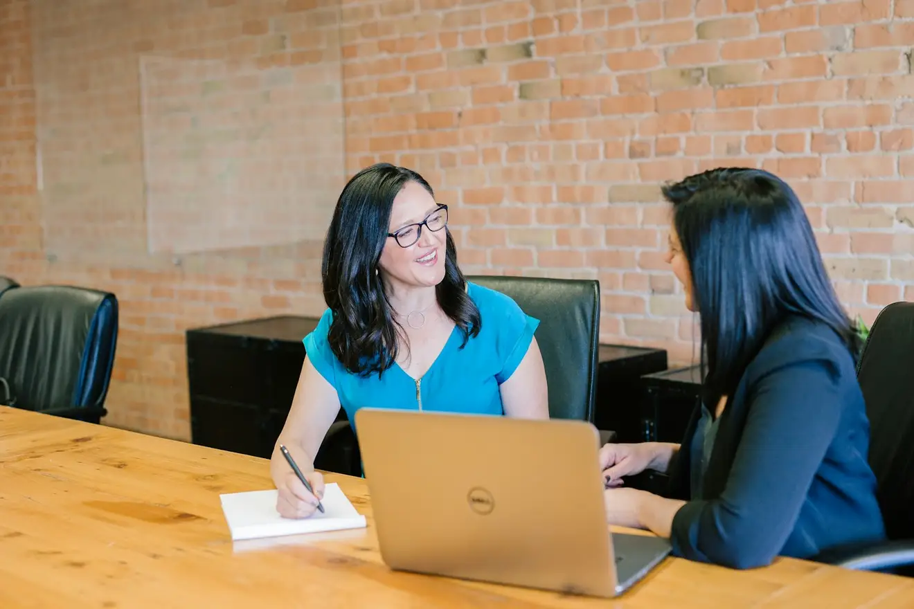 Professional team reviewing business verification information